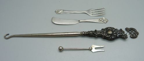 A small continental silver knife and fork with cockerel motif to handle, a silver pickle fork and