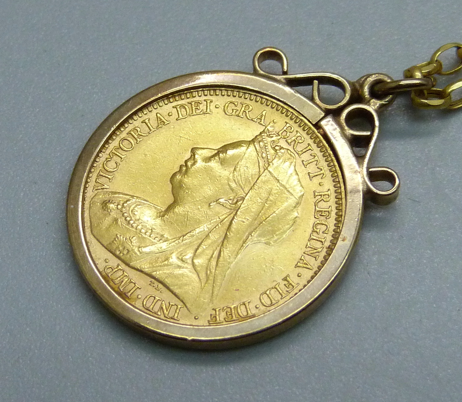A Queen Victoria 1900 gold half-sovereign in a 9ct gold pendant mount and on a 9ct gold chain, total - Image 2 of 3