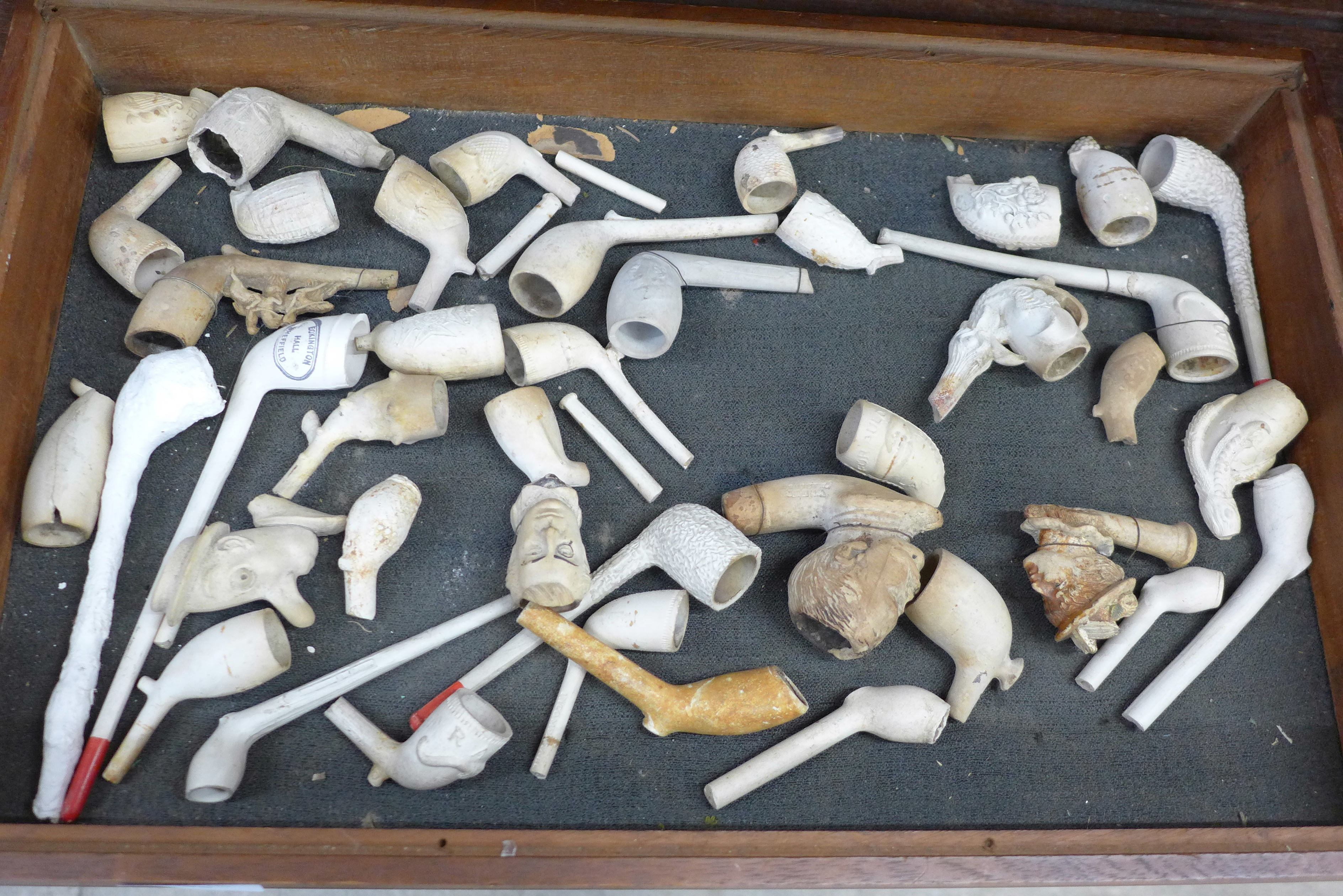 A box of clay pipes