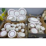 A large collection of Royal Doulton Minuet dinnerware and teaware; tureens, coffee cups saucers,