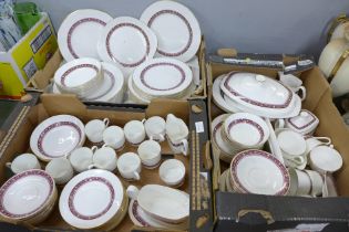 A large collection of Royal Doulton Minuet dinnerware and teaware; tureens, coffee cups saucers,