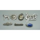 Seven silver brooches, one with Chester mark, all test as silver, 35g