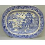 A 19th Century blue and white Willow pattern serving plate, 46cm