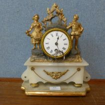 A 19th Century French gilt metal and alabaster mantel clock