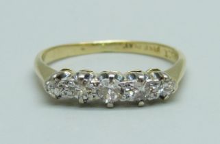 A 1970's 18ct gold and platinum set five stone diamond ring, P, 2.4g, 0.35cts of graduated diamonds