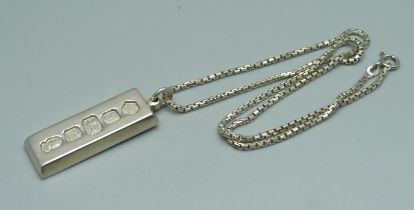 A silver ingot on a silver chain, 38g