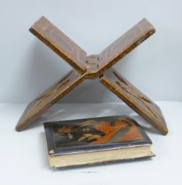 A Quran book stand and an empty Japanese photograph album