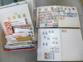 A box of stamps, covers, a 1999 Australian year book, etc