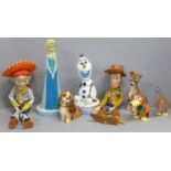 A collection of Disney items including Frozen figures