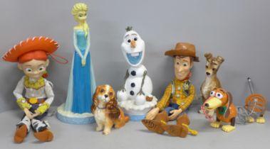 A collection of Disney items including Frozen figures