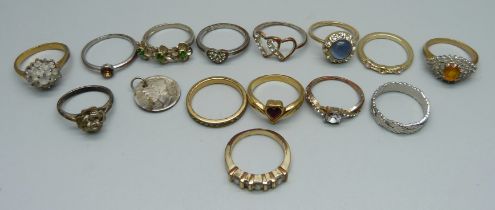 Fourteen rings, (two silver)