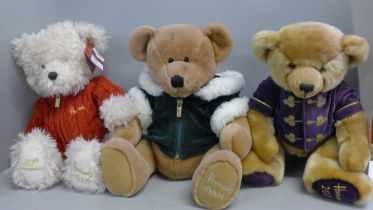 Three Harrods teddy bears, 2000, 20001 and 2015 and a Mulholland & Bailic Labrador on wheels