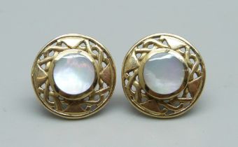 A pair of hallmarked 9ct gold and mother of pearl Celtic design ear studs, 3.9g