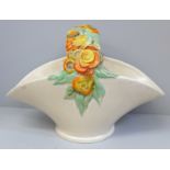 A Clarice Cliff basket vase, a/f, chip to rim