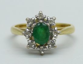 An 18ct gold, emerald and diamond cluster ring, 4.3g, N/O