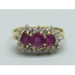 An 18ct gold, ruby and diamond ring, 4.1g, J/K