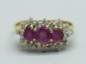 An 18ct gold, ruby and diamond ring, 4.1g, J/K