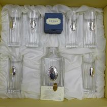 A Sovrani Argenti set of six hi-ball tumblers and decanter, with a silver plaque to each front,
