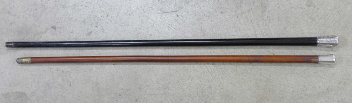 A Victorian silver topped and ebonised walking cane and one other silver topped walking cane