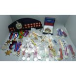 Five WWII medals, a collection of replica miniature medals, a military cap, a badge and a pocket