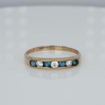 A 9ct gold, blue and white paste set ring, 1.5g, R