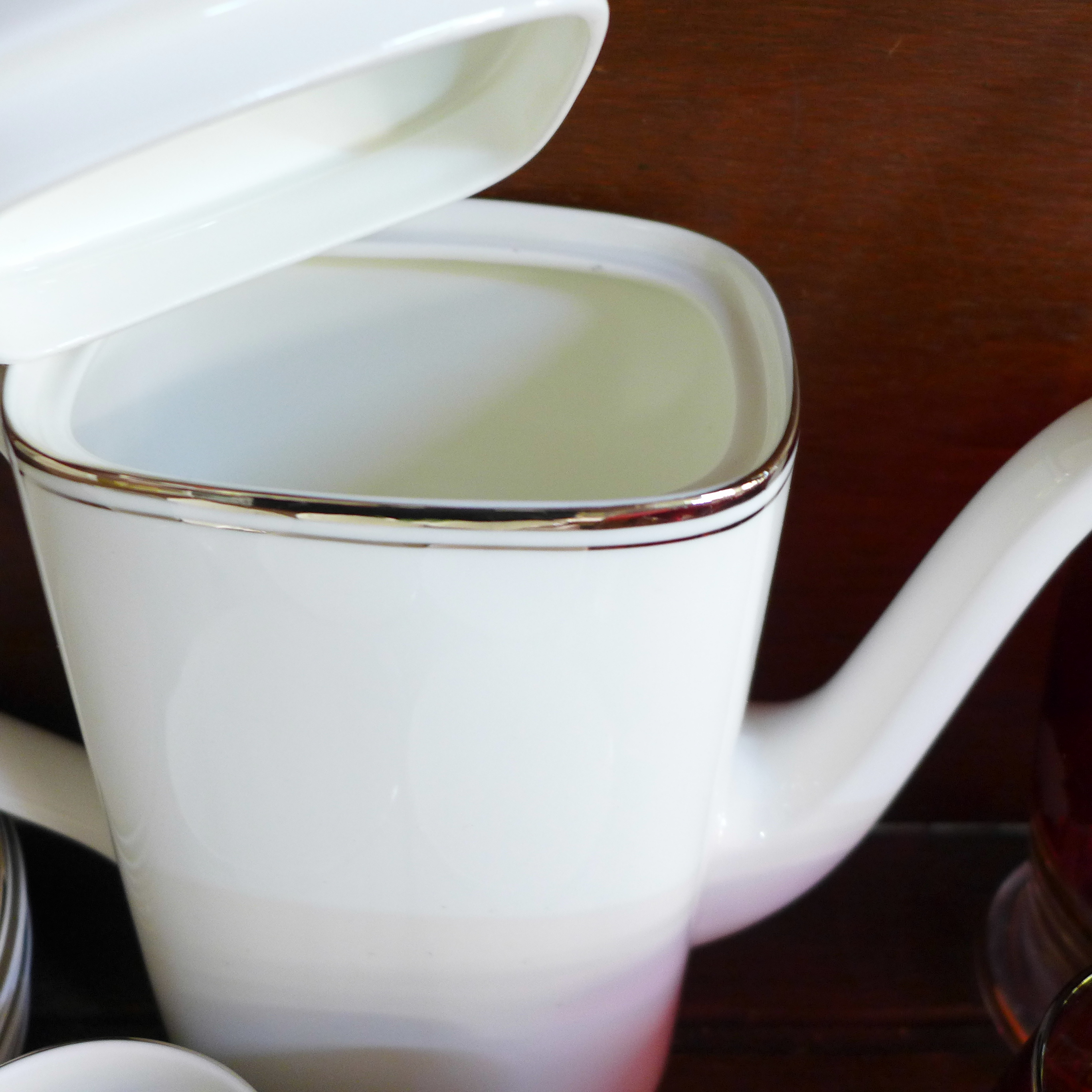 A Royal Doulton Platinum Concorde set comprising a coffee pot, milk jug, sugar bowl and six cups and - Image 4 of 4