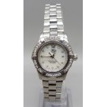 A lady's Tag Heuer Aquaracer wristwatch set with 45 diamonds, approximately 0.55 carat diamond