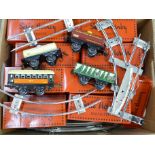 Twenty-six French issue Hachette Reproductions 'Series Hornby' O gauge wagons, coaches and track