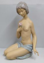 A large Lladro model, Nude with Rose, 48cm, a/f (finger tip missing)