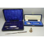 A silver tooth fairy pot, a cased silver spoon, part manicure set and a letter opener with silver