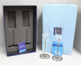 A pair of Royal Selangor The Victoria and Albert Museum champagne flutes, boxed, 28cm