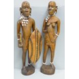Two African carved wooden figures with bead jewellery