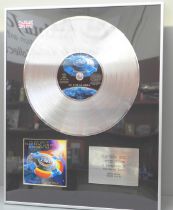 An ELO Platinum Disc, Limited Edition, in recognition of Worldwide sales, Number 2 of 20, All Over