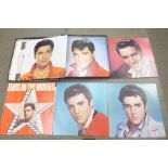 An Elvis Presley Greatest Hits box set, seven LP records