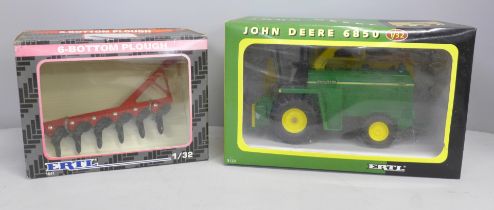 An Ertl model John Deere 6850 Forage Harvester and a 6-Bottom Plough, boxed
