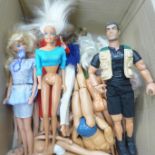 A box of Barbie, Sindy and Action Man dolls