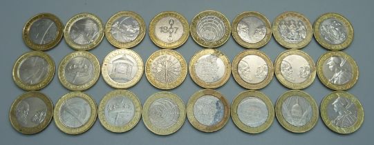 Twenty-four collectable £2 coins including four Darwin, four WWI, two Shakespeare, etc.