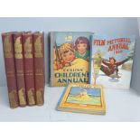 Four bound volumes of Punch from 1902, 1905, 1912 and 1916 and three vintage annuals; The Prize,