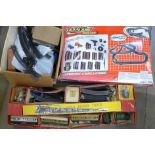 A Fastlane Racing Extreme Challenge racing set, a Twin Trix Railway 00 gauge train set, boxed and