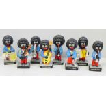 Eight Robertsons advertising figures, (These items are listed on the basis they are illustrative