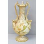 A Worcester Royal China Works blush ivory three handled vase, 698-G, 20cm, a/f