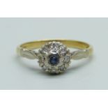 An 18ct gold, sapphire and diamond cluster ring, 2.8g, M/N