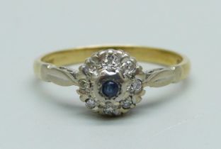 An 18ct gold, sapphire and diamond cluster ring, 2.8g, M/N