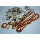 A collection of amber jewellery and costume jewellery