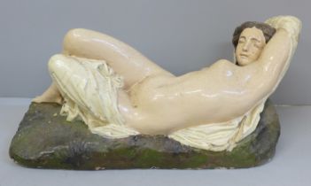 A vintage model of a reclining nude signed R. Wood