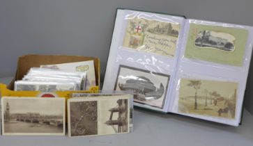 A box of London and suburbs postcards with an album of 200 cards and a similar number loose