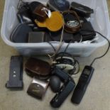 Camera equipment; a box of light meters, filters and cable releases