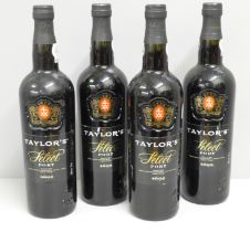 Four bottles of Taylor's Port