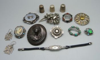 Antique jewellery; a carved cameo brooch, a Scottish silver brooch, a Victorian silver brooch, an
