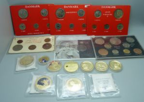A collection of commemorative coins including gold plated, 1965 British proof set, a Queen